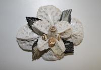 Flower pin made of Alligator scales